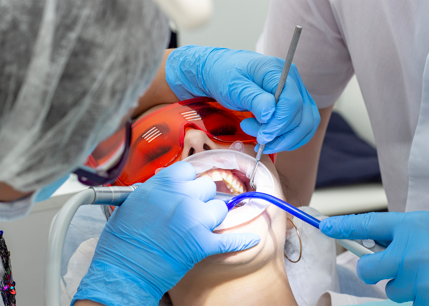 Patient undergoing oral surgery at Sukriti Hospital in Bharuch. Dr. Vihang Sukhadia performing advanced dental and oral surgical procedures.
