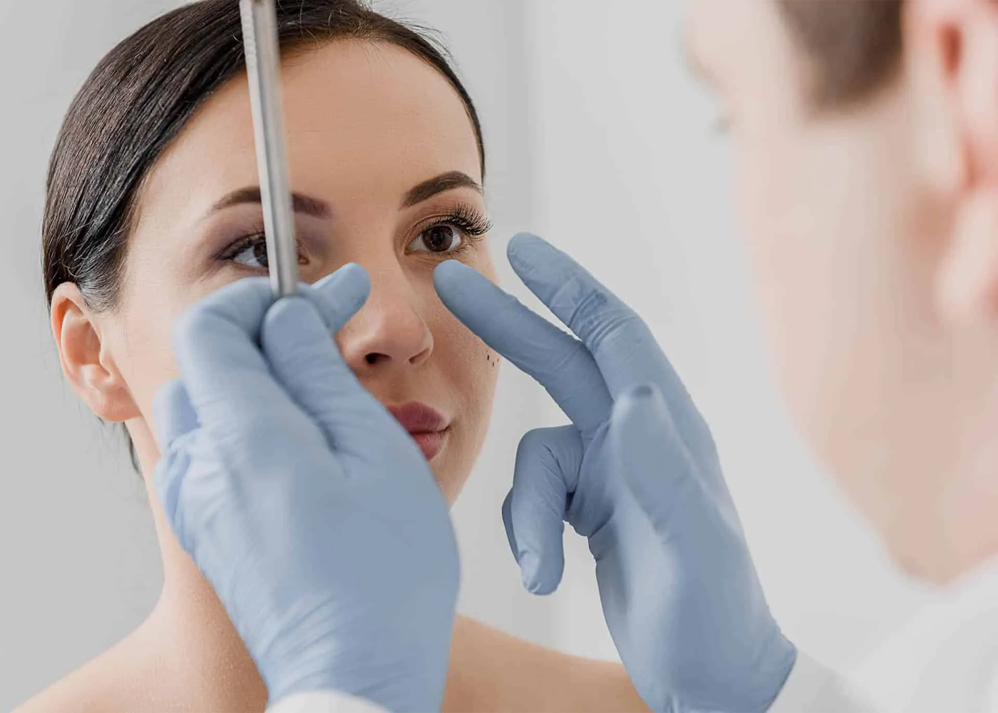 Dr. Vihang Sukhadia conducting advanced facial plastic surgery for birth defects at Sukriti Hospital in Bharuch. Expert reconstructive surgery for cleft lip, palate, and other facial anomalies.